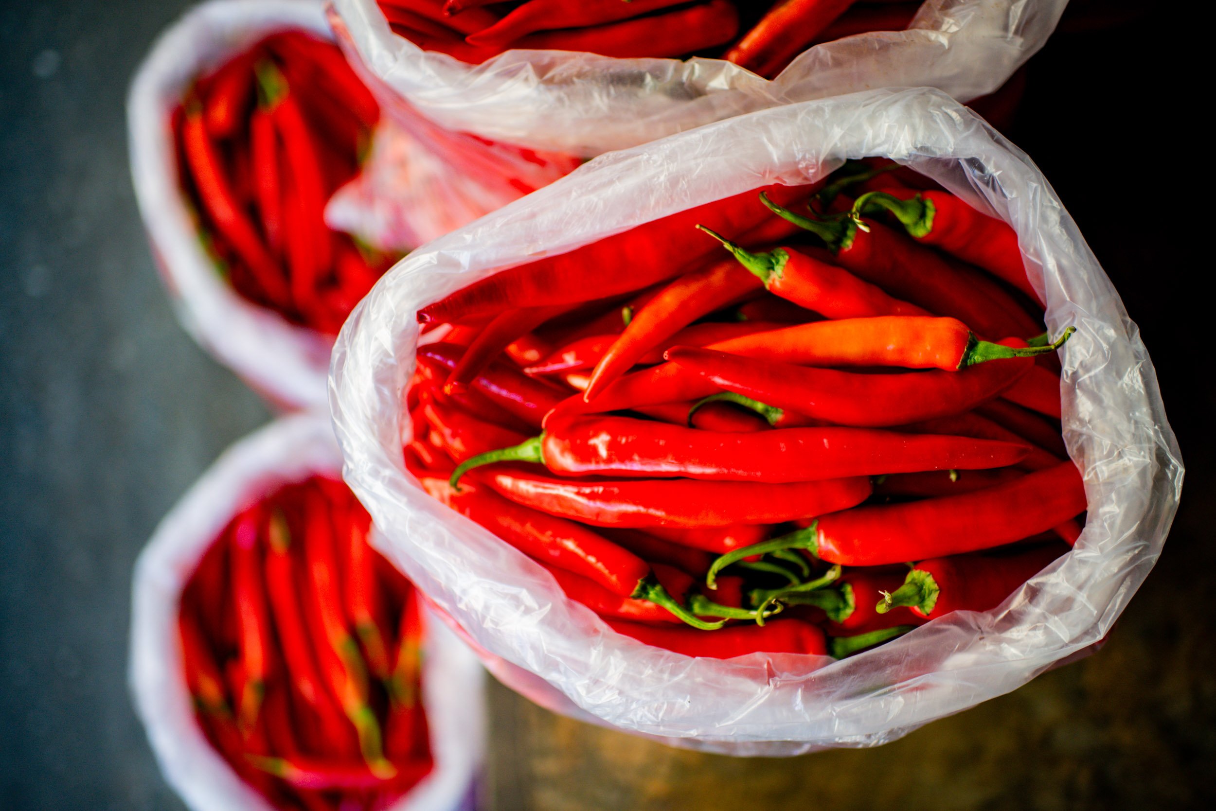 close up of red chilis at the market for article on Street and travel photography in Chiang Mai © Kevin Landwer-Johan