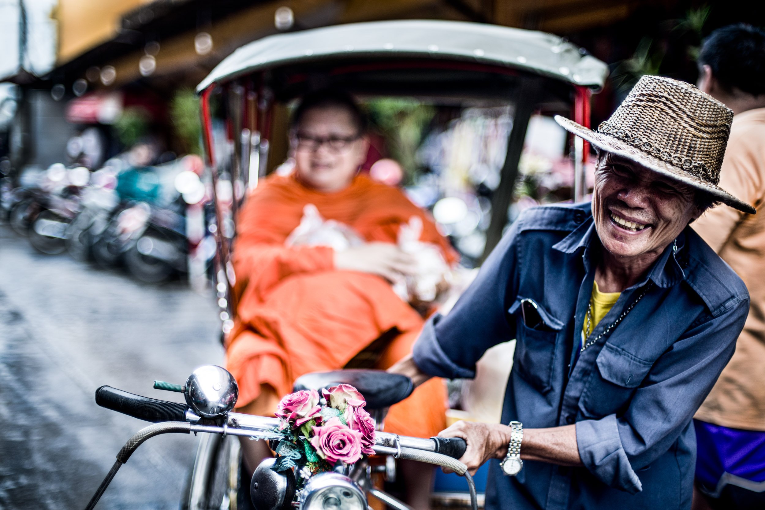 Monk in a Samlor for article on street photography in Chiang Mai © Kevin Landwer-Johan