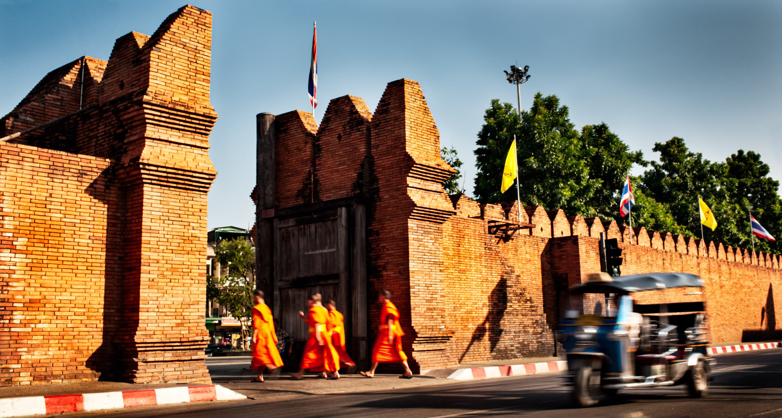 Monks and a Tuktuk in Chiang Mai, Thailand © Kevin Landwer-Johan